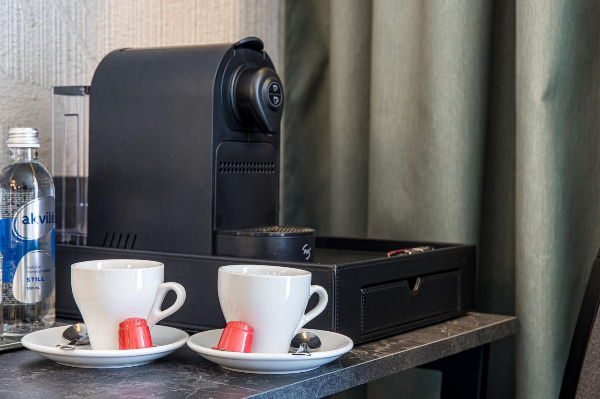 Mercure Palanga Vanagupe Resort & Spa Экстерьер фото A Nespresso coffee machine
