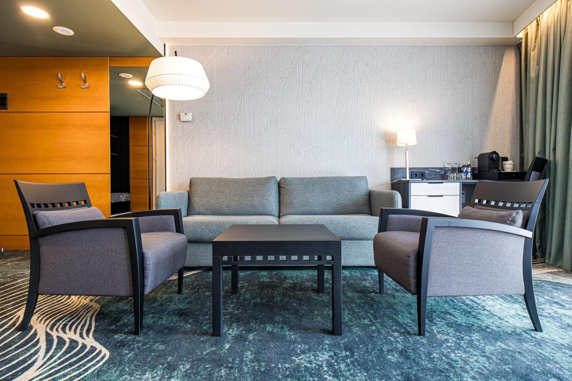 Mercure Palanga Vanagupe Resort & Spa Экстерьер фото A living room in a hotel suite